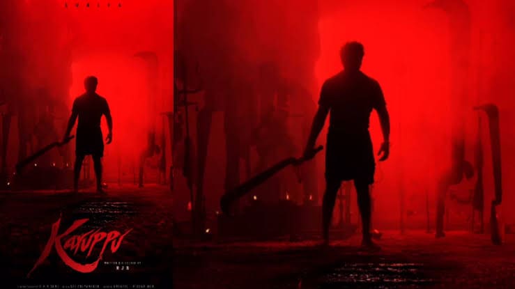 Suriya’s first look in Karuppu wearing black shirt and lungi holding cigar
